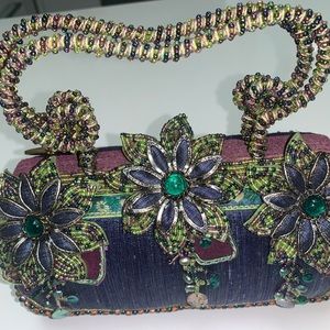 Mary Frances beaded opulent,rhinestones, studs, crystals from all over the world